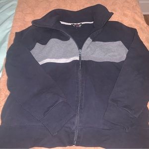 Zip up mid length crop sweater.